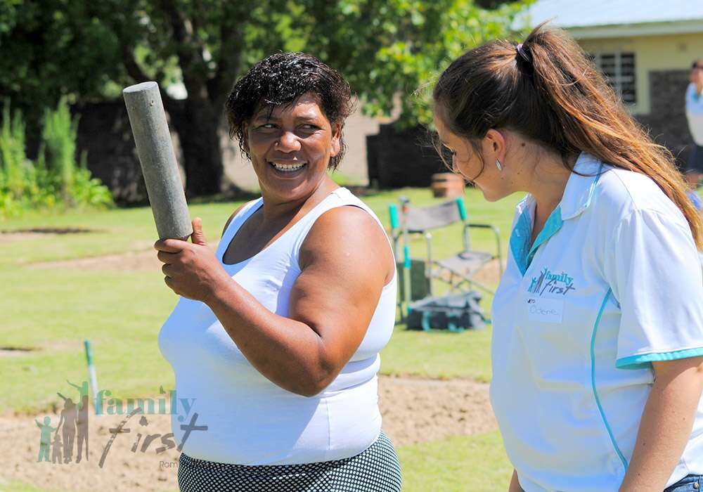 Woman ready to throw jukskei pin
