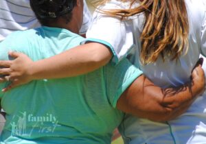 Two women hugging